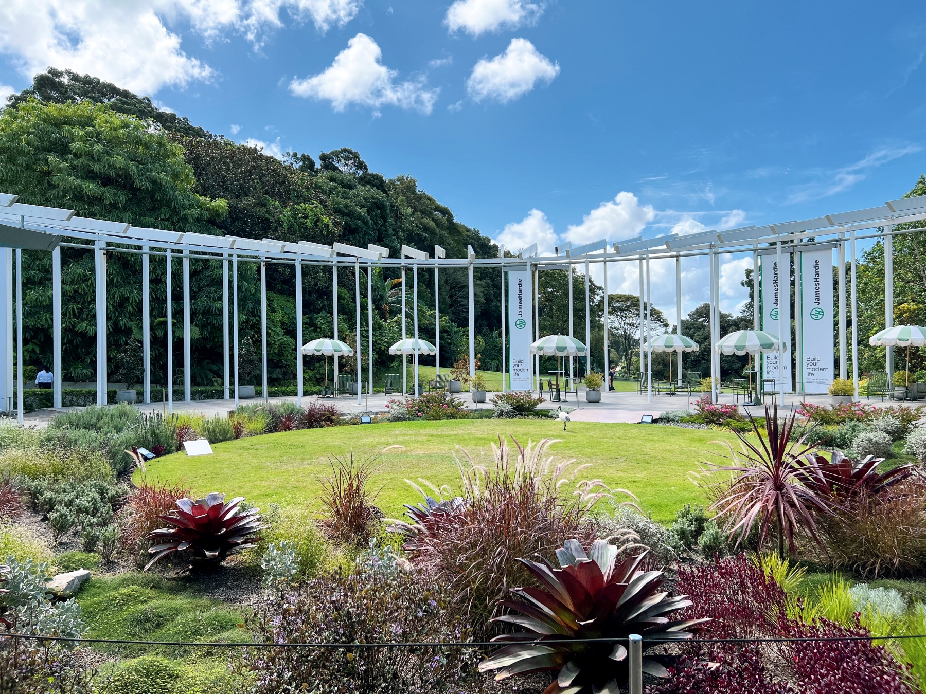 A scenic view of The Calyx in Sydney’s Royal Botanic Gardens, the setting for the James Hardie Modern Homes Forecast 2025, showcasing its open-air structure and lush greenery.